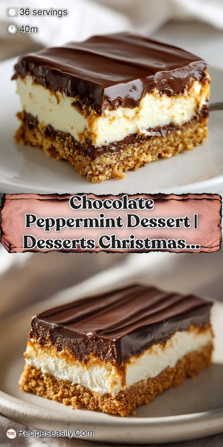 Close-up of a creamy chocolate layer with a glossy finish, topped with a sharp, bright red peppermint candy shard.